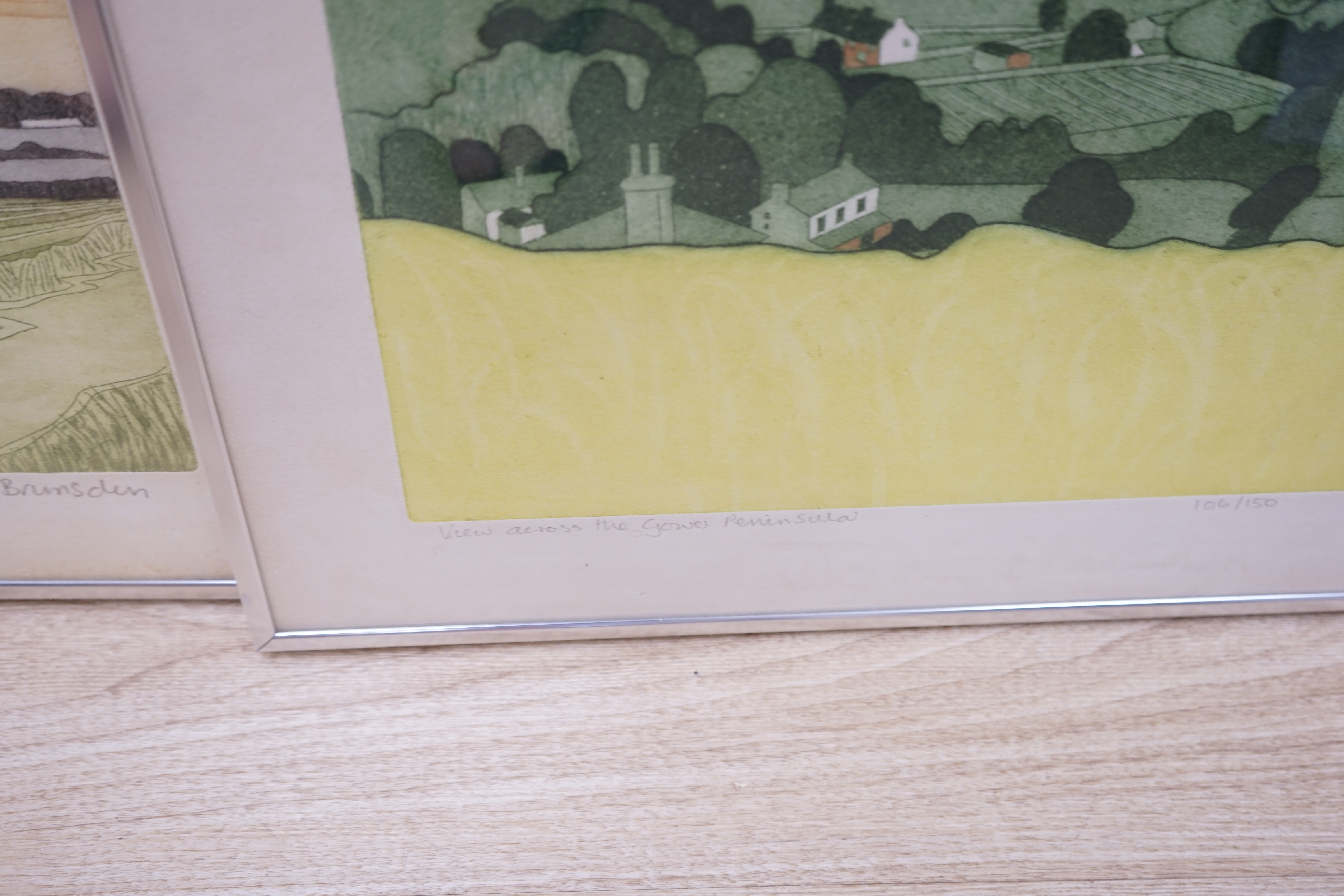 John Brunsdon (1933-2014), near pair of etchings with aquatint, 'A view across the Gower Peninsula and ‘Suffolk Scene’, each limited edition, signed in pencil, largest 55 x 70cm. Condition - fair, some discolouration and